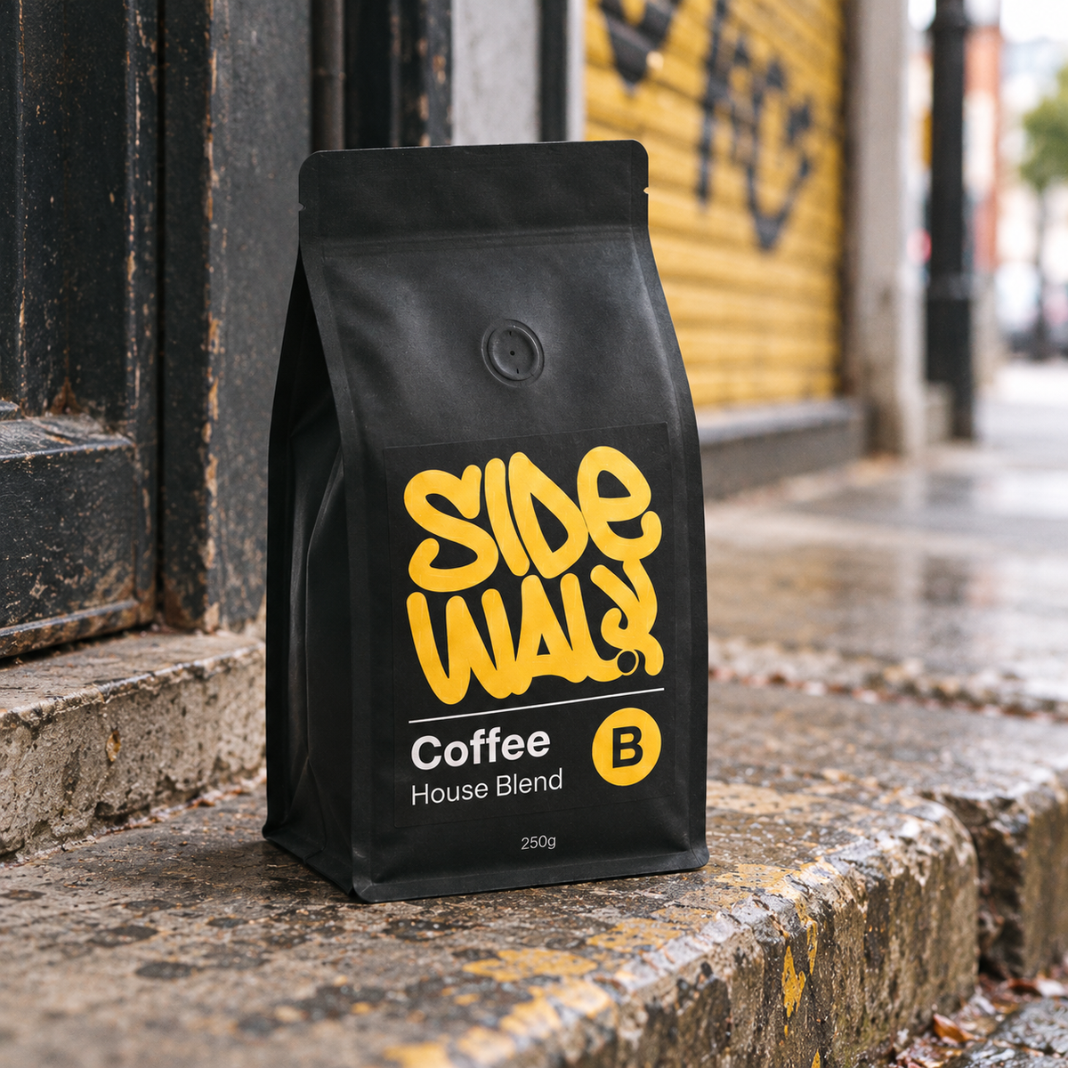 Sidewalk House Blend 250g coffee bag photographed from a street angle with fine film grain