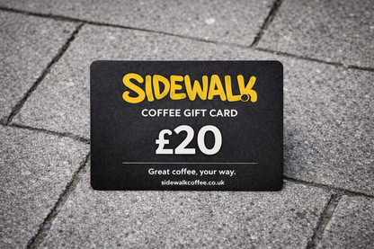 Sidewalk Coffee gift card on a pavement