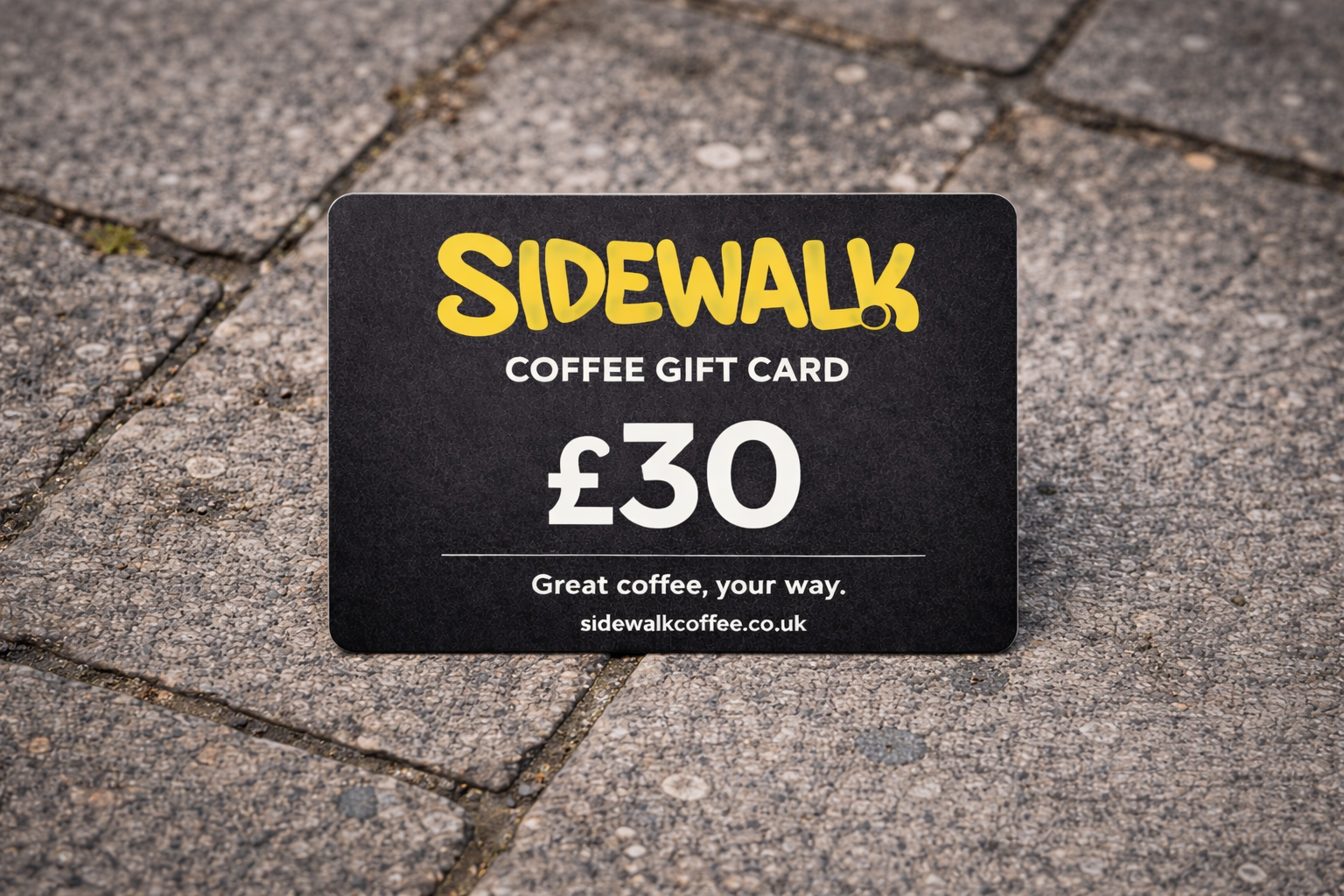 Sidewalk Coffee gift card worth £30 on a pavement