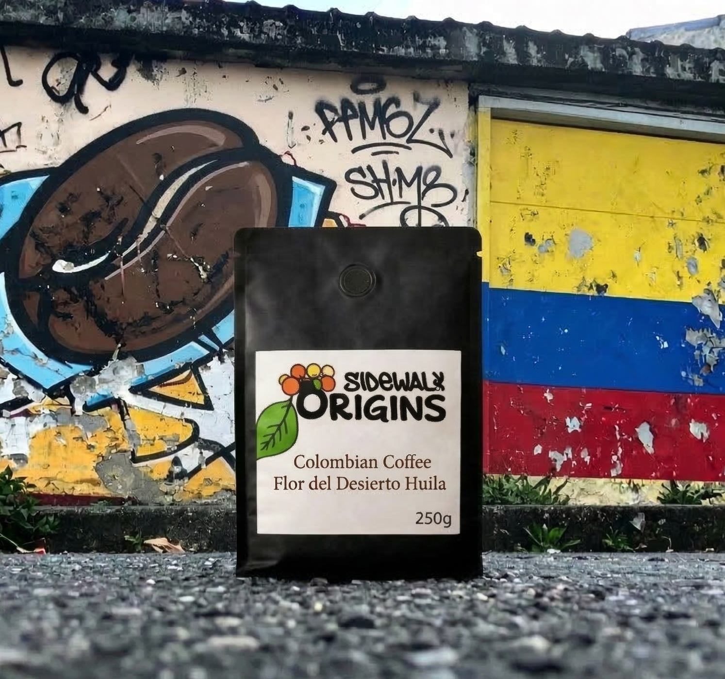 Sidewalk Origins coffee bag in front of a colorful graffiti wall